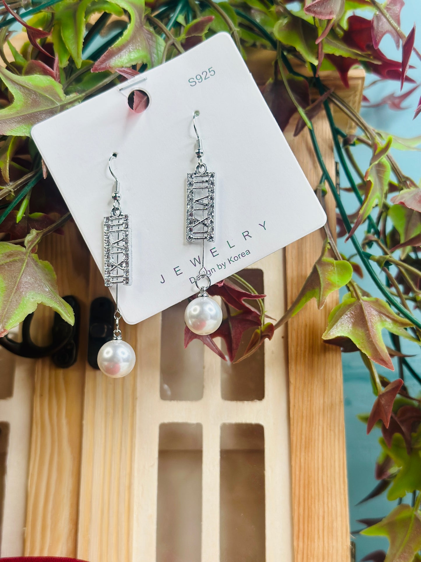 PEARLUX BLOOM - AN HANGING STAR EARRING